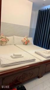 Voodi või voodid majutusasutuse Tây Nguyên Hotel Đà Nẵng toas