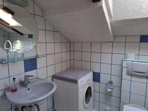 Koupelna v ubytování Ferienwohnung Jutta + 9 fotografií