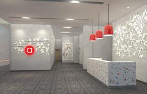 a lobby with a red q sign on the wall at Amaris Hotel Manado in Manado