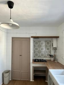 Kuchyň nebo kuchyňský kout v ubytování Casa Corata