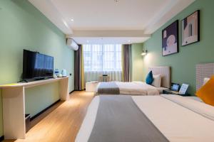 Televisi dan/atau pusat hiburan di LIU YUAN Amoy Smart Hotel 厦门留苑智能酒店