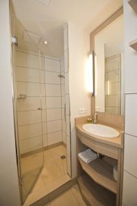 Koupelna v ubytování Heinrich Pesch Hotel