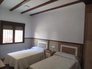 Postel nebo postele na pokoji v ubytování Apartamento El Botanico II