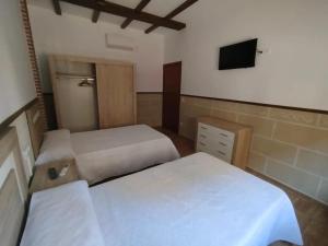 Postel nebo postele na pokoji v ubytování Apartamento El Botanico II