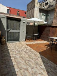 A patio or other outdoor area at La casa del mulino
