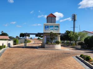 a sign for a petrol station on a road at Olive's Nest 2 in Velddrif +2 photos