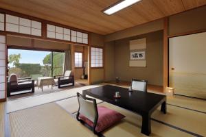 Uma área de estar em 季粋の宿 紋屋
