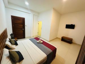 Φωτογραφία από το άλμπουμ του Cafe Pinnalanda Rooms σε Pinnawala