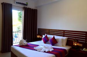 Φωτογραφία από το άλμπουμ του Cafe Pinnalanda Rooms σε Pinnawala