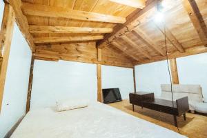 Postel nebo postele na pokoji v ubytování hinatabocco guesthouse