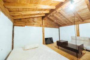 Postel nebo postele na pokoji v ubytování hinatabocco guesthouse