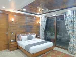 Voodi või voodid majutusasutuse BnBBuddy Home Gurugram toas