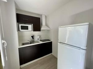 Køkken eller tekøkken på Confortable appartement proche du lac et pistes cyclables pour 6 personnes + 11 billeder