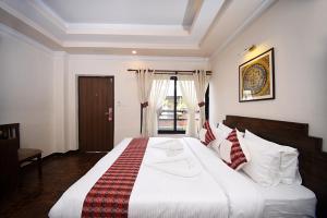 Skye Inn Kathmandu客房内的一张或多张床位