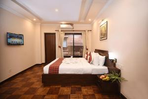 Skye Inn Kathmandu客房内的一张或多张床位