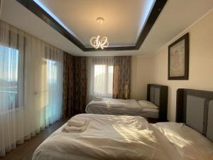 Postel nebo postele na pokoji v ubytování Alanya Bektas Private Villa