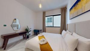 Bilde i galleriet til Primestay - Empire Residence - Spacious 1BR with Community Views in JVC i Dubai