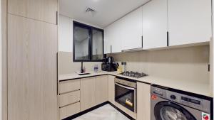 Bilde i galleriet til Primestay - Empire Residence - Spacious 1BR with Community Views in JVC i Dubai