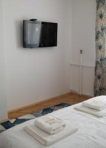 Letto o letti in una camera di M2-apartments