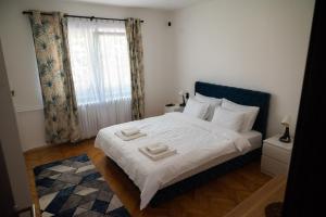Letto o letti in una camera di M2-apartments