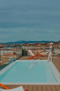 The swimming pool at or close to Kora Green City - Aparthotel Passivhaus