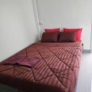 Postel nebo postele na pokoji v ubytování ชินวดี อินทนนท์รีสอร์ท