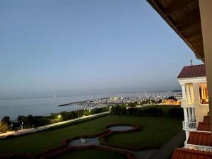 a view of the ocean from the balcony of a resort at Morada Strandhotel Ostseebad Kühlungsborn in Kühlungsborn