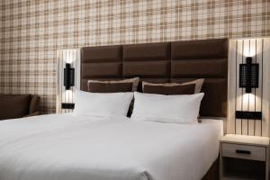 Postel nebo postele na pokoji v ubytování Hotel Innception