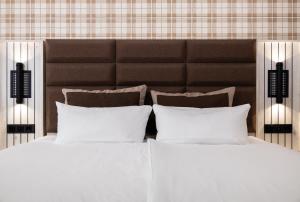 Postel nebo postele na pokoji v ubytování Hotel Innception