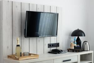 TV a/nebo společenská místnost v ubytování Hotel Innception