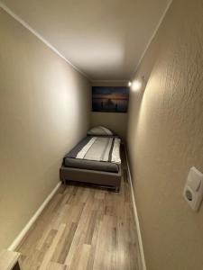 Ένα ή περισσότερα κρεβάτια σε δωμάτιο στο Maluma Monteur Apartment