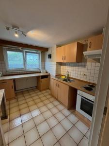 Η κουζίνα ή μικρή κουζίνα στο Maluma Monteur Apartment +1 φωτογραφίες