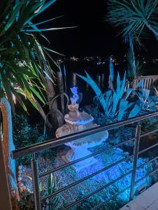 a miniature garden on a rail with plants at Apartments Ranko in Zavalatica
