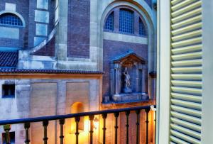 a view of a building from a balcony at NH Collection Madrid Palacio de Tepa in Madrid