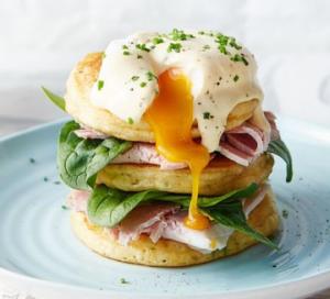 a breakfast sandwich with an egg on a plate at Mary Apartments in Stalida +22 photos
