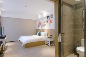 Kupatilo u objektu Paco Hotel Tiyuxilu Metro Guangzhou-Free Shuttle Bus during Canton Fair