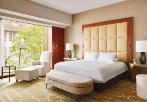 A bed or beds in a room at Park Hyatt Zurich – City Center Luxury