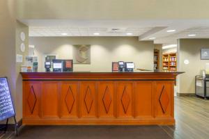 a lobby with a large wooden counter in a store at Comfort Inn & Suites Jerome - Twin Falls in Jerome