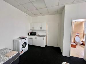 Kuchyň nebo kuchyňský kout v ubytování Apartmany Fit Gym