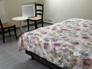 Ένα ή περισσότερα κρεβάτια σε δωμάτιο στο Gite Herlaimont