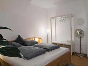 Ein Bett oder Betten in einem Zimmer der Unterkunft Stop & Sleep Ybbs