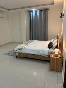 En eller flere senge i et værelse på Les Résidences Aya Et Fils 1 + 3 billeder