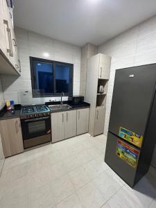 Køkken eller tekøkken på Les Résidences Aya Et Fils 1