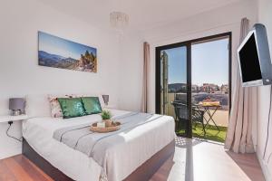 Postel nebo postele na pokoji v ubytování Villa Iga Gran Canaria