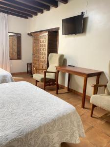 Cama o camas de una habitación en Casa Sara