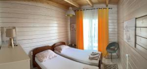 Postel nebo postele na pokoji v ubytování SeaStar Eco Villa