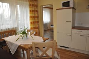 Kuchyň nebo kuchyňský kout v ubytování Haus Voithofer