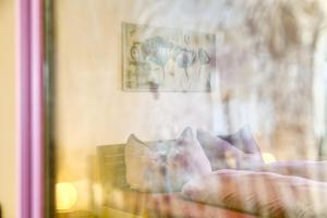Postel nebo postele na pokoji v ubytování Apart Sunnseitn Rofan und Spieljoch