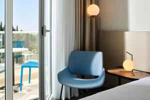 Posteľ alebo postele v izbe v ubytovaní Maistra Select Astarea Hotel + 26 fotografií