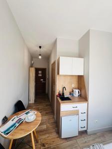 Kuchyňa alebo kuchynka v ubytovaní Property Apart - Ruska Centrum